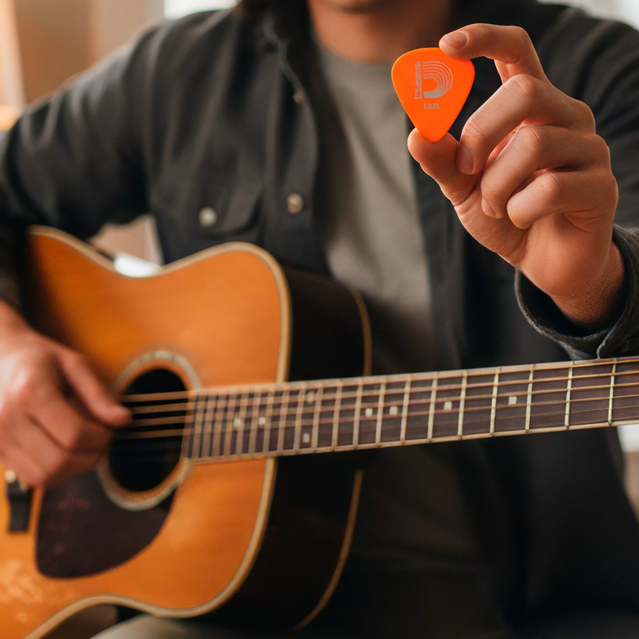 Puas Daddario Duralin 10-pack de 0.60 mm, set de plumillas anaranjadas Planet Waves Derlin, alta durabilidad y precisión 6DOR2-10