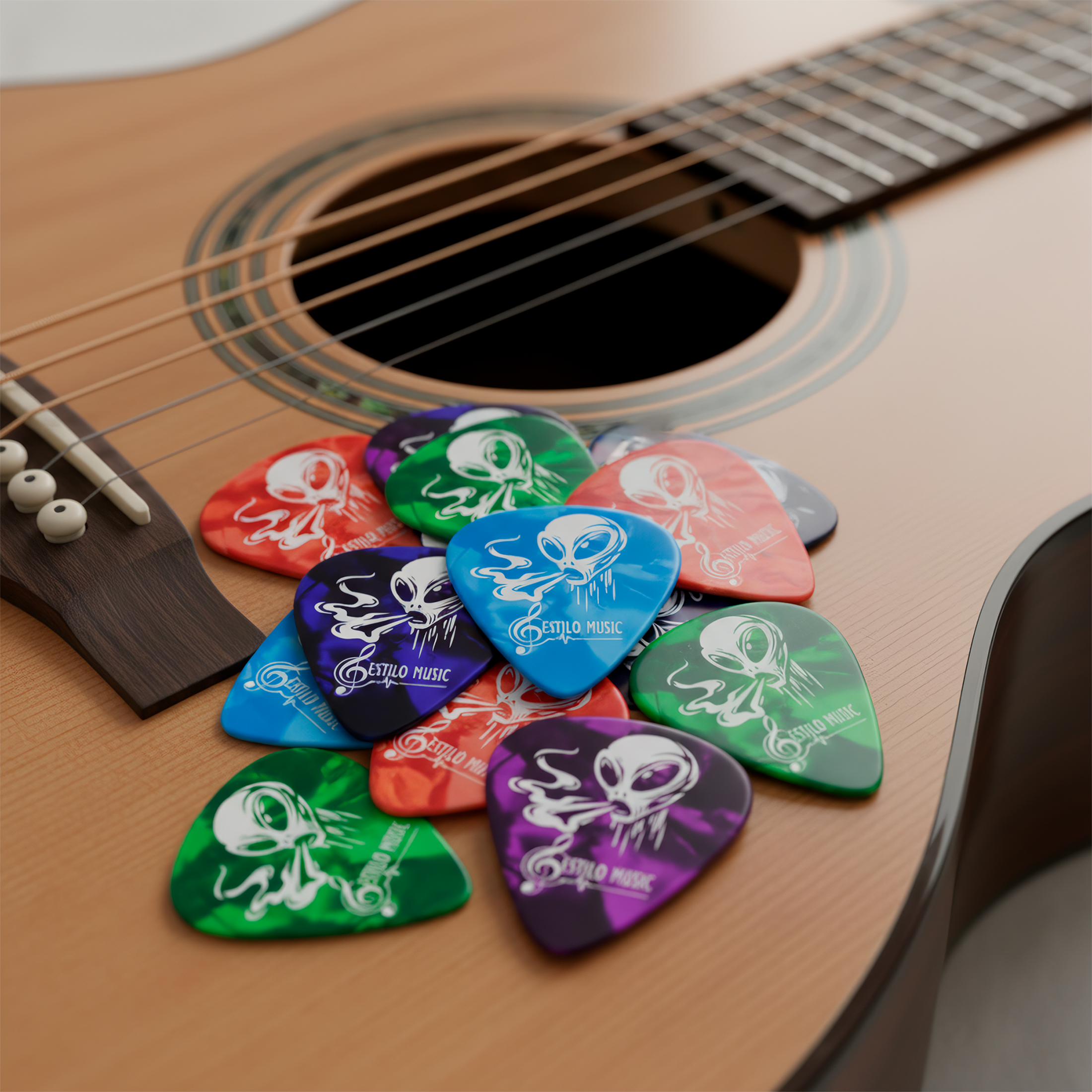 Set de 10 Puas Guitarra Celuloide Alien Toxic marca Estilo Music, colección Alien Toxic con colores aleatorios, fabricadas en celuloide resistente con máxima memoria y mínimo desgaste. PCT10