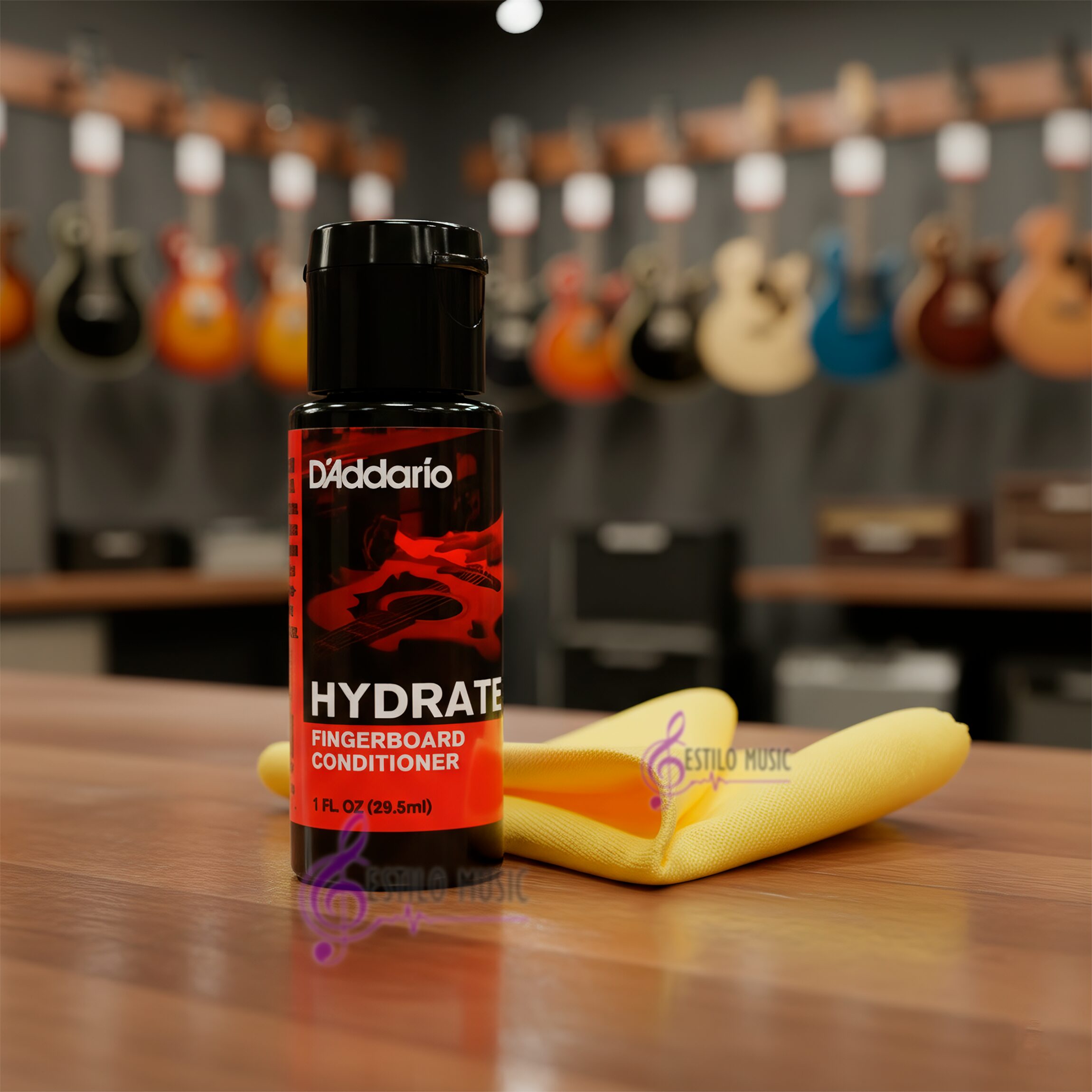 Kit D’Addario PW‑FBCS Planets Waves con botella de aceite limpiador de 60 ml y paño de microfibra, fórmula sin acumulación para limpiar y acondicionar diapasones de madera oscura.