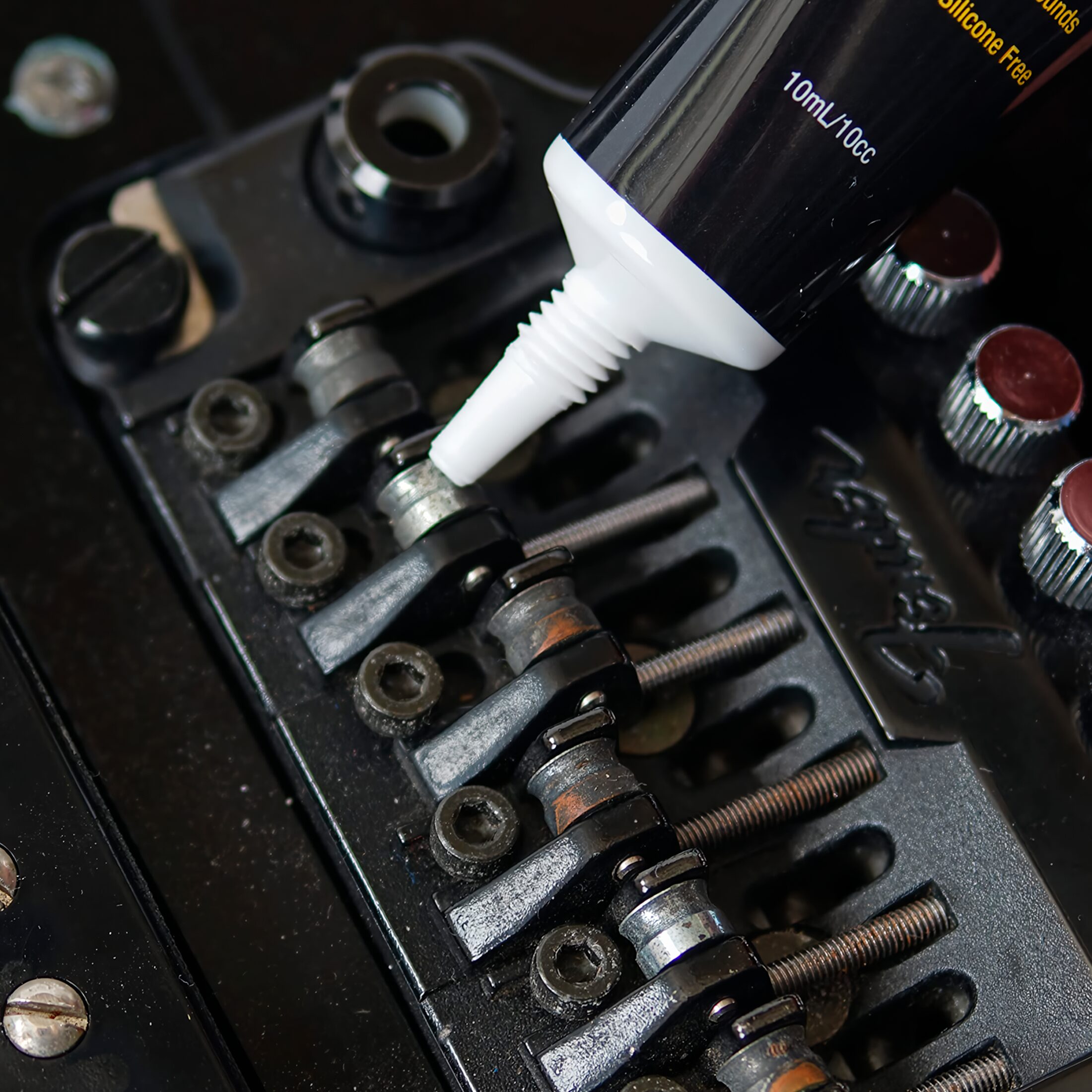 Lubricante P/ Cuerdas Guitarra Music Nomad MN106 para mejorar afinación y reducir desgaste.