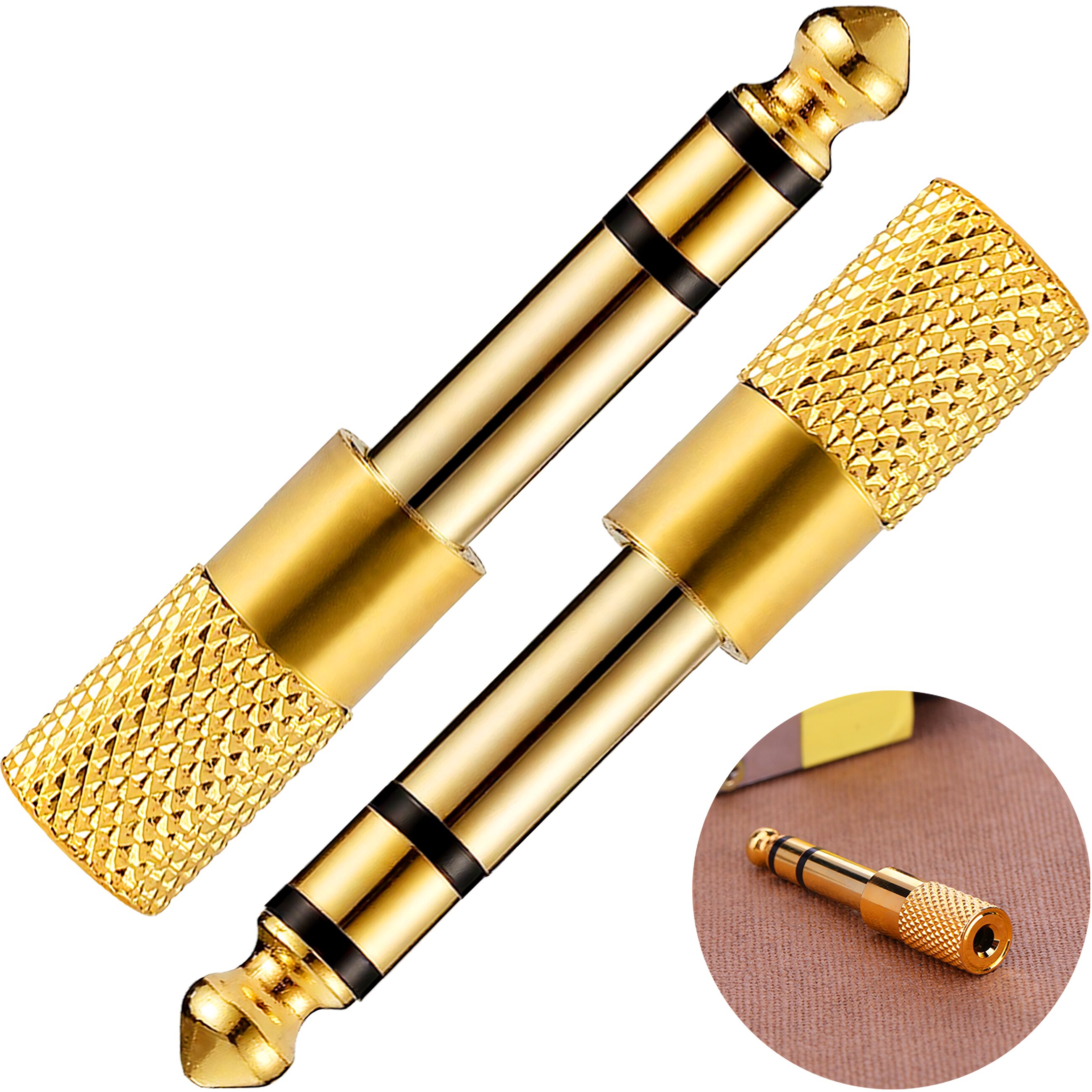 Adaptador de audio estéreo 6.5 mm macho a 3.5 mm hembra tipo plug auxiliar, carcasa metálica con aislante negro, ideal para conectar audífonos o cables auxiliares en amplificadores y equipos de sonido AA36