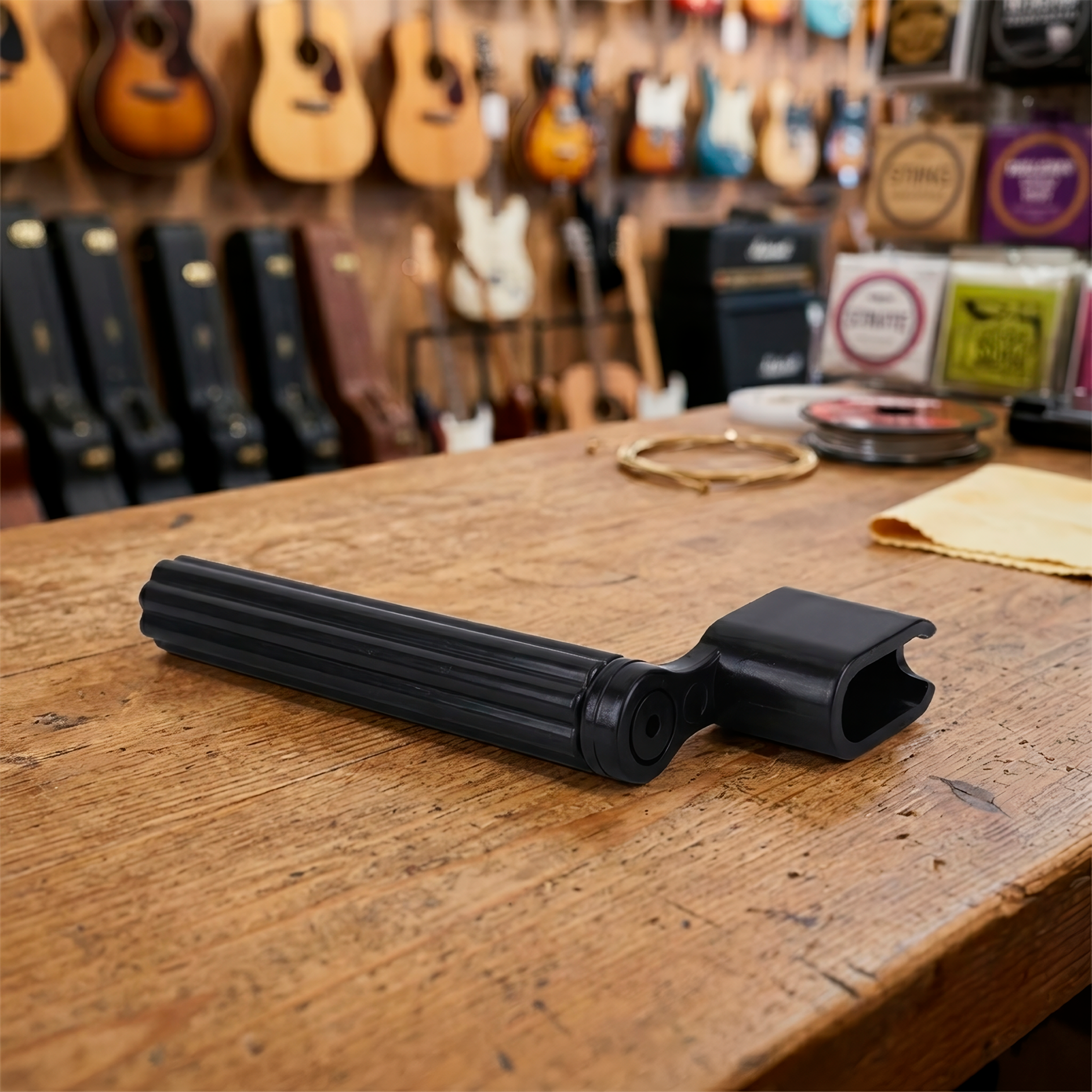 Bobinadora de Cuerdas P/ Guitarra multifuncional color negro con quita pines integrada para guitarra acústica y eléctrica