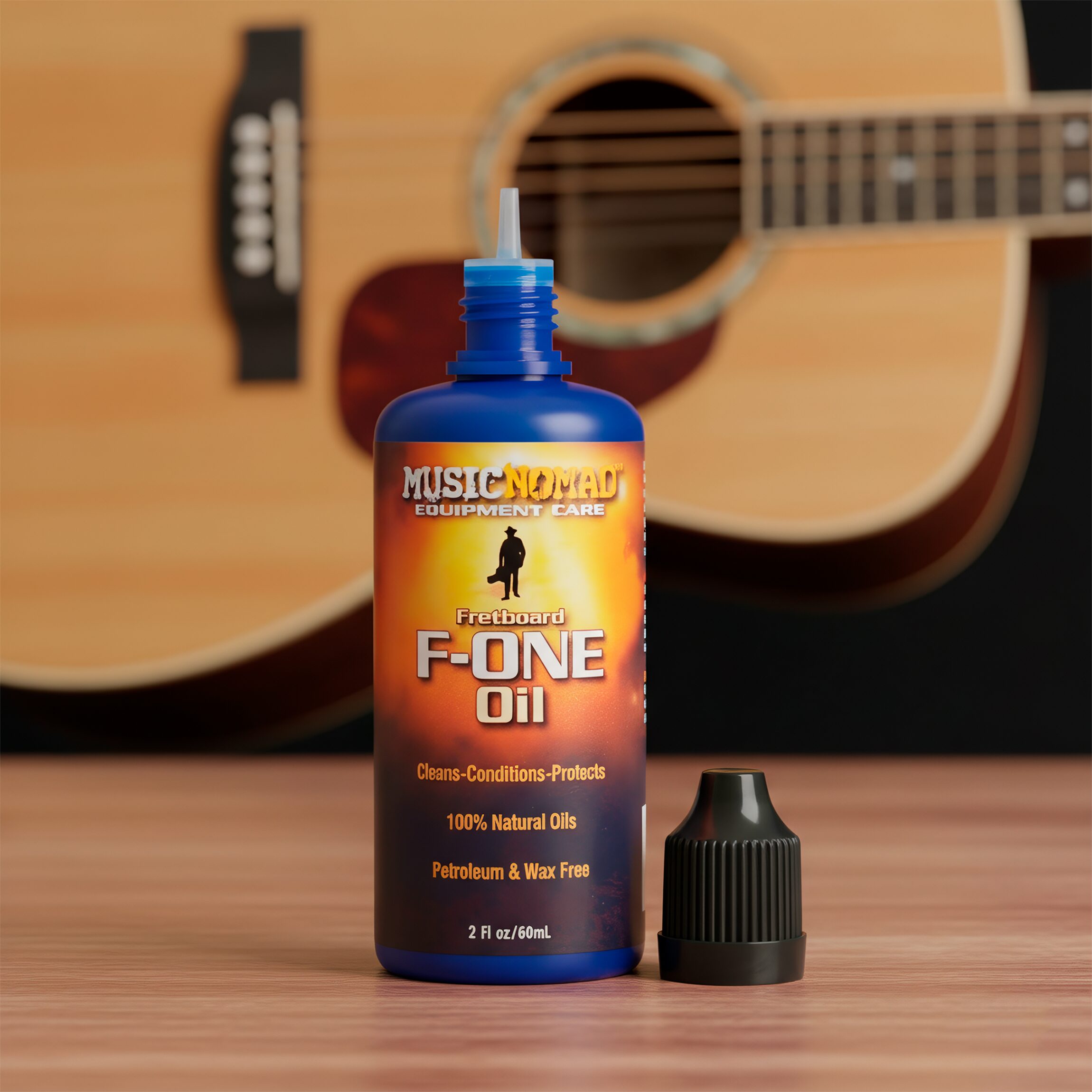 Music Nomad Aceite Limpiador P/ Diapasón F-One MN105 60 ml con aceites naturales para limpiar, acondicionar y proteger el diapasón de guitarras, bajos, ukuleles y otros instrumentos de cuerda. Incluye paño de microfibra para una aplicación limpia y rápida.