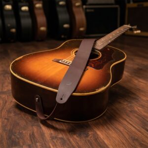 Correa De Piel P/ Guitarra Daddario Cuero 25BL01 color café, ajustable y fabricada en piel auténtica
